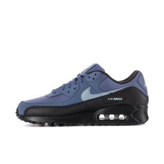 Men's blue running sneaker with swoosh, lace-up design, and heel Air window