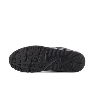 Men's blue running sneaker outsole with black tread and molded patterns