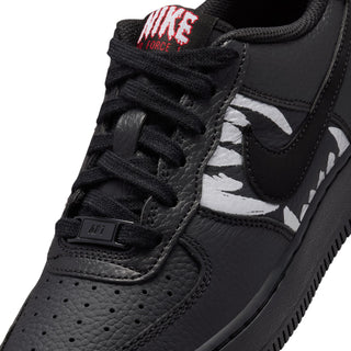 Kids' black Air Force 1 sneaker with red “AIR” lace tag and white wolf graphic