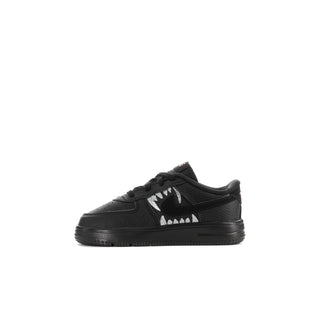 Kids' black low-top sneakers, angled side view with white graphic panels and red accent