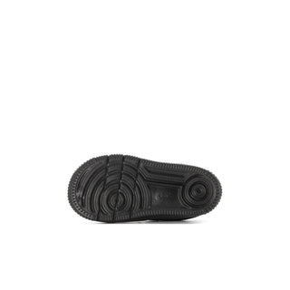 Toddler black sneakers outsole with textured tread and circular traction pods
