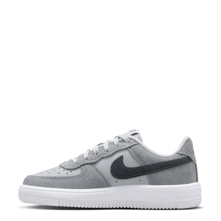 Kids Air Force 1 lace-up sneakers in smoke gray, angled side view with swoosh.