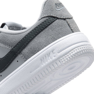 Kids Air Force 1 close-up: smoke gray side panel and white outsole traction detail.