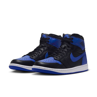 Pair of black and royal blue high-top sneakers with blue swoosh and white midsole