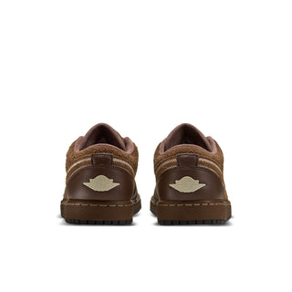 Womens low-top sneakers, back view, dark brown suede with logo patch and stitched heel