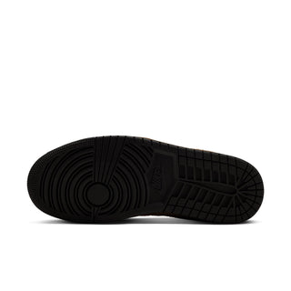 Womens sneaker outsole view with black traction tread under low-top shoe