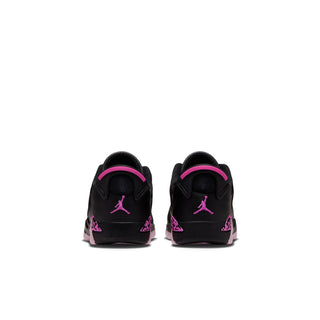 Kids low-top sneakers, black with bright pink heel accents and Jumpman branding