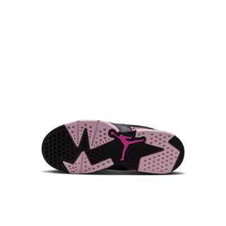 Kids sneaker outsole, black tread with pink rubber panels and Jumpman logo