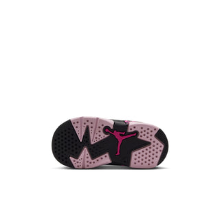 Black and pink toddler sneaker outsole with fuchsia Jumpman and star graphic