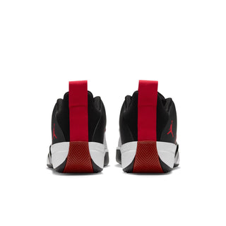 Men's black sneakers, heel view with red heel strap and white outsole