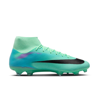 Men's soccer cleat in bright mint and teal with black swoosh and stud sole