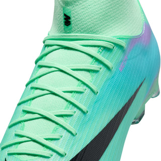 Men's soccer cleat close-up of mint laces and teal textured upper with swoosh