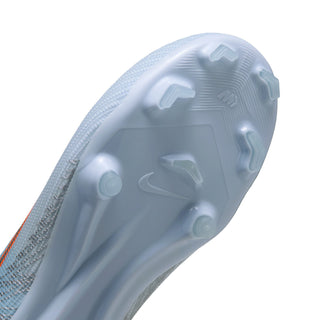 Youth light blue boot sole with molded traction studs for multi-ground play