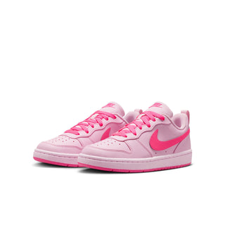 Youth pink low-top sneakers, pink laces, swoosh on side, white midsole