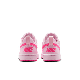 Youth pink low-top sneakers with pink heel tab and signature swoosh on back