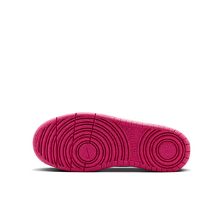 Youth pink rubber outsole with circular tread pattern, low-top sneaker bottom
