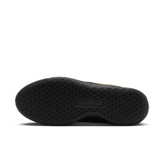 Men's black rubber outsole with textured grip and gold accent