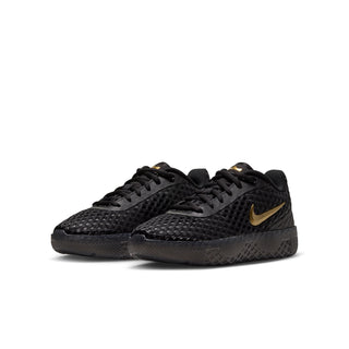 Youth black lace-up sneaker with gold swoosh, side profile, and textured outsole