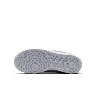 Youth sneaker outsole with textured tread and light gray rubber