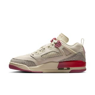 Women’s low-top sneakers in pale ivory with pink lace detail and red midsole