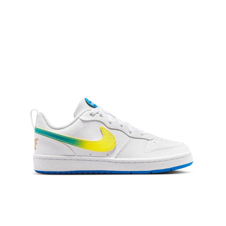 Youth low-top sneakers, white with yellow Nike swoosh and teal stripe, blue sole