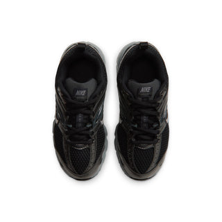 Pair of black Nike Air Max Moto 2K kids' sneakers viewed from above
