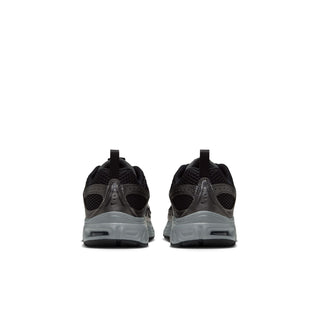 Pair of Nike Air Max Moto 2K kids' sneakers showing gray heels and air-cushioned soles