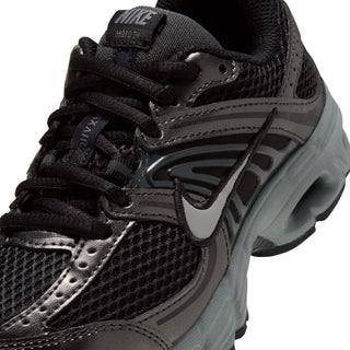 Nike Air Max Moto 2K kids' sneaker close-up showing mesh, laces, and side logo