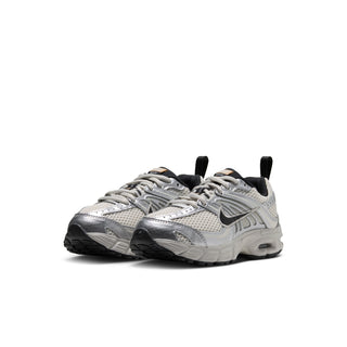 Pair of Nike Air Max Moto 2K kids' sneakers, front three-quarter view with mesh uppers.