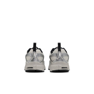 Pair of Nike Air Max Moto 2K kids' sneakers viewed from the heel, with pull tabs and air-cushioned soles.