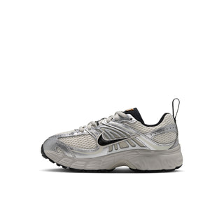 Nike Air Max Moto 2K kids' sneaker in side view, showing the silver Swoosh and layered mesh upper.