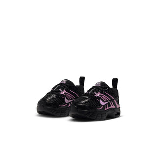 Pair of black toddler sneakers with pink stripe detailing and chunky outsole