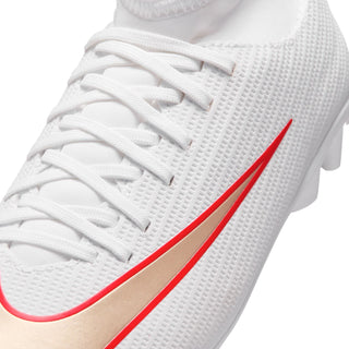 White kids cleat lace-up forefoot with red-trim swoosh logo