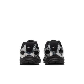 Youth black and metallic silver running shoe, heel view with Nike logo and cushioned back