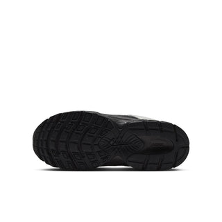 Youth black and metallic silver shoe outsole, tread pattern and branding near arch