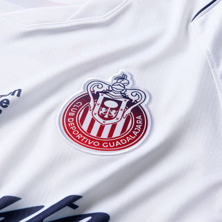 Men's white soccer jersey close-up of Chivas crest logo