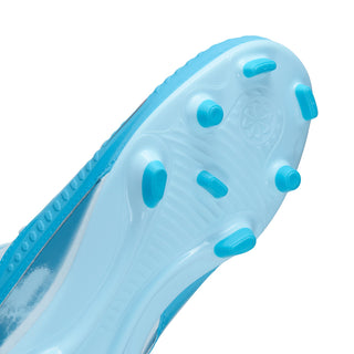 Youth cleat bottom close-up, light blue TPU outsole with round stud nubs