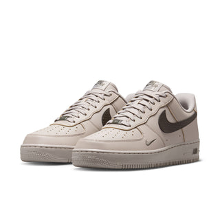 Men's Air Force 1 low-top sneakers, light beige uppers with dark Swoosh, front view