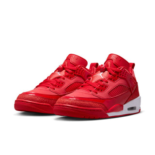 Women’s red lace-up low-top sneakers with layered side panels and white sole