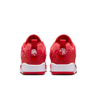 Women’s red lace-up sneakers with white heel sole and rear pull-tab logo accents