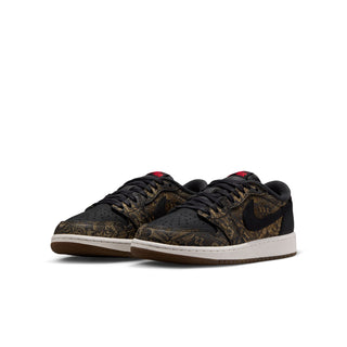 Youth low-top sneakers, side view; black and gold patterned uppers with red details
