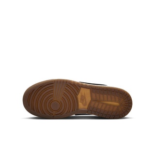 Youth low-top sneaker outsole, brown rubber tread with circular traction pattern