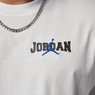 Close-up of men's white crew-neck T-shirt with Jordan logo on chest