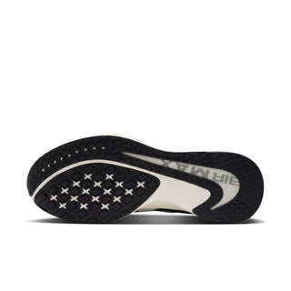 Nike Air Max sneakers outsole, dark rubber tread with pale midsole