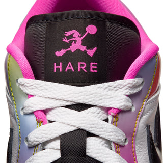 AJ 1 Low sneaker close-up of black Hare tongue label, pink lining and white laces