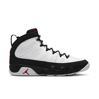 White and black high-top sneakers with red Jumpman accents and lace-up design