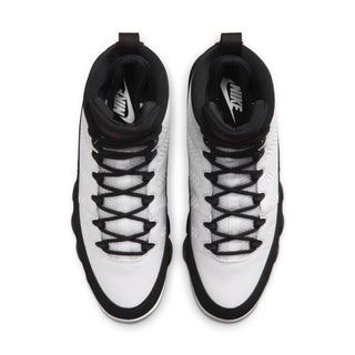 Pair of white high-top sneakers with black laces and black padded collars