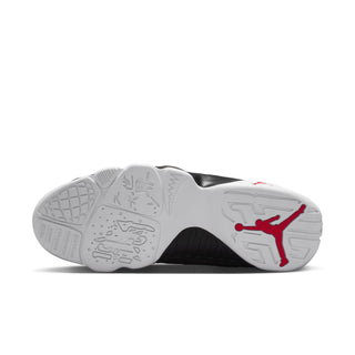 White and black outsole view of high-top sneakers with red Jumpman logo