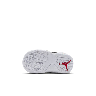 Toddler high-top sneaker outsole, light-gray tread with red and black Jumpman icons.