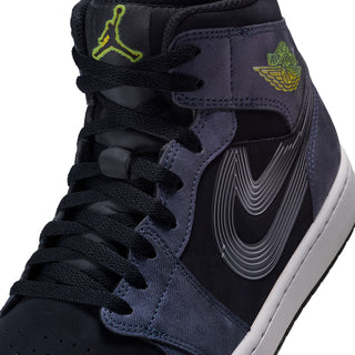 Close-up of navy mid-top sneakers: black laces, wing logo, neon green Jumpman